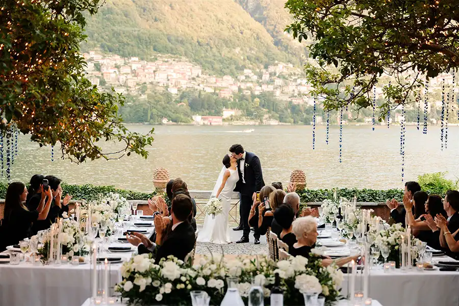 An intimate lakeside reception during a luxury wedding on Lake Como.