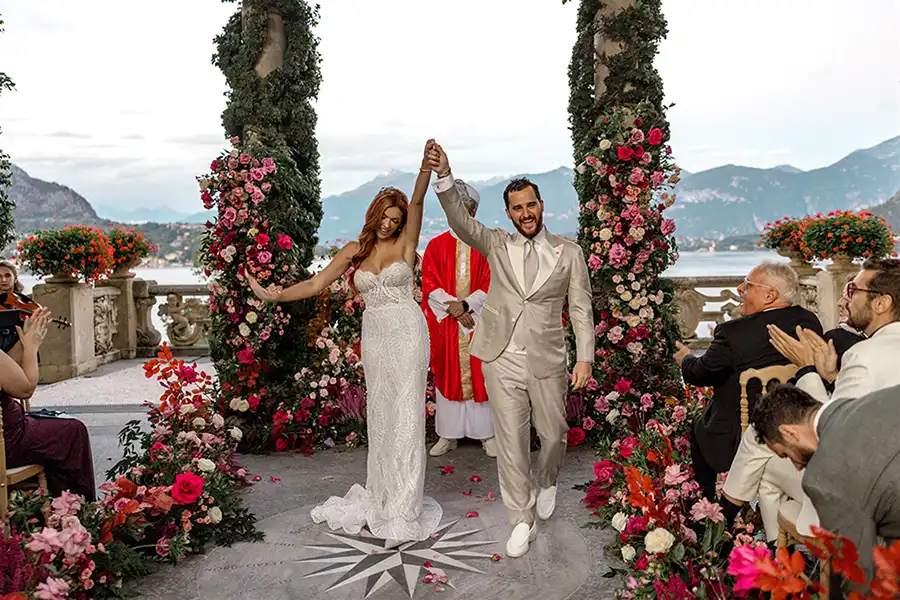 A joyful wedding celebration framed by spectacular floral design on Lake Como.