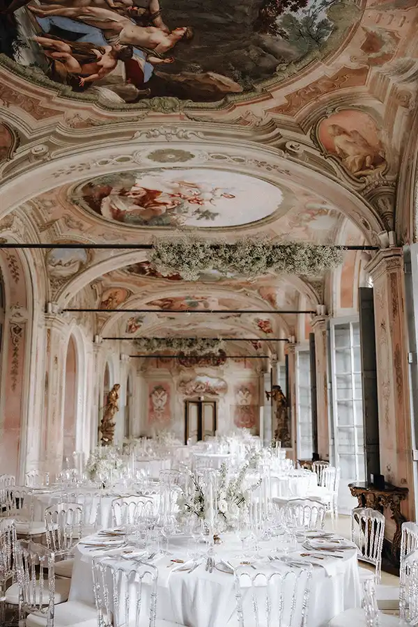Elegant wedding reception in a frescoed historic venue on the Italian Riviera