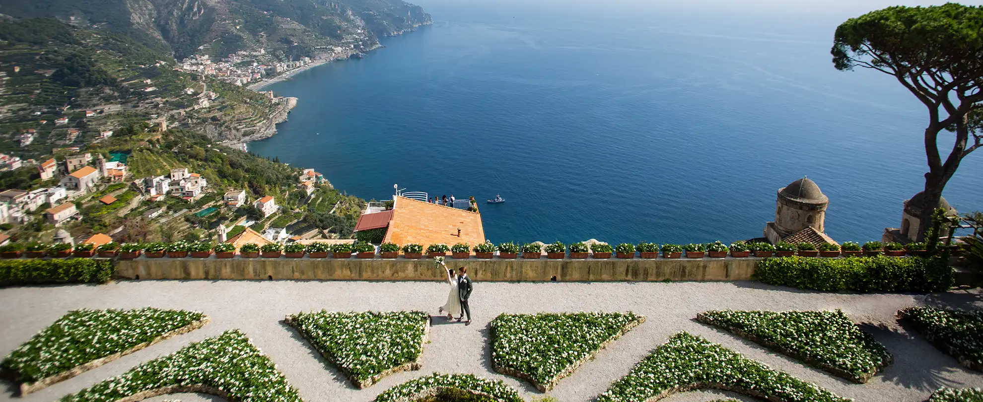 Bride and groom overlooking the Amalfi Coast during their wedding in Italy
