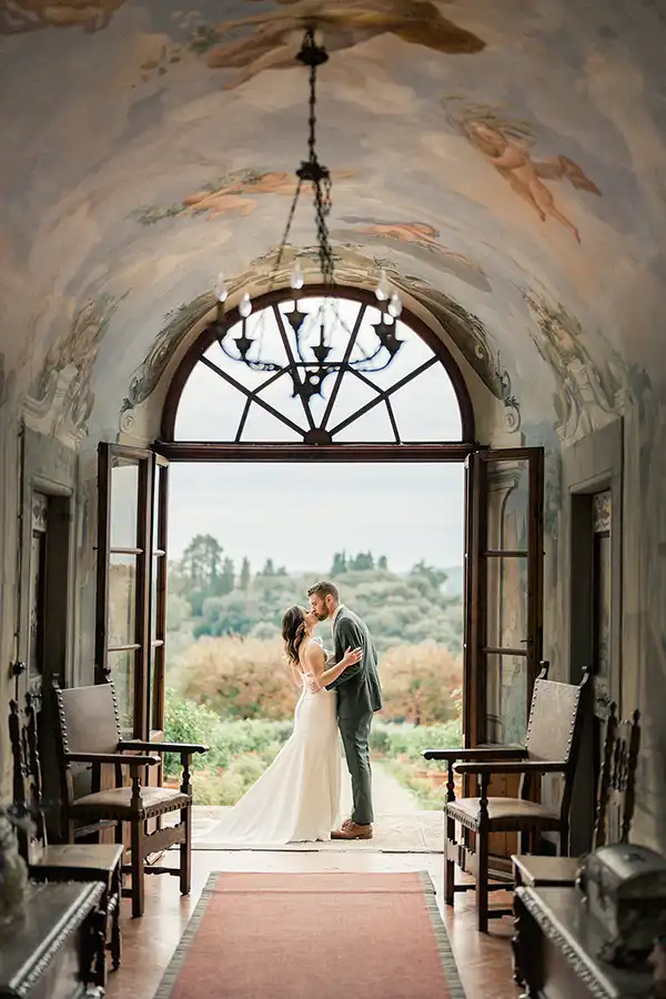 Bride and groom at a historic wine estate in Tuscany